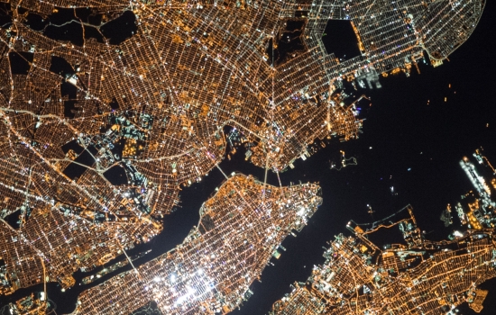 An arial view of a city lights at night An arial view of a city lights at night