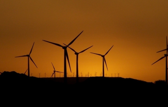 Silhouette of wind turbines in the sunset Silhouette of wind turbines in the sunset