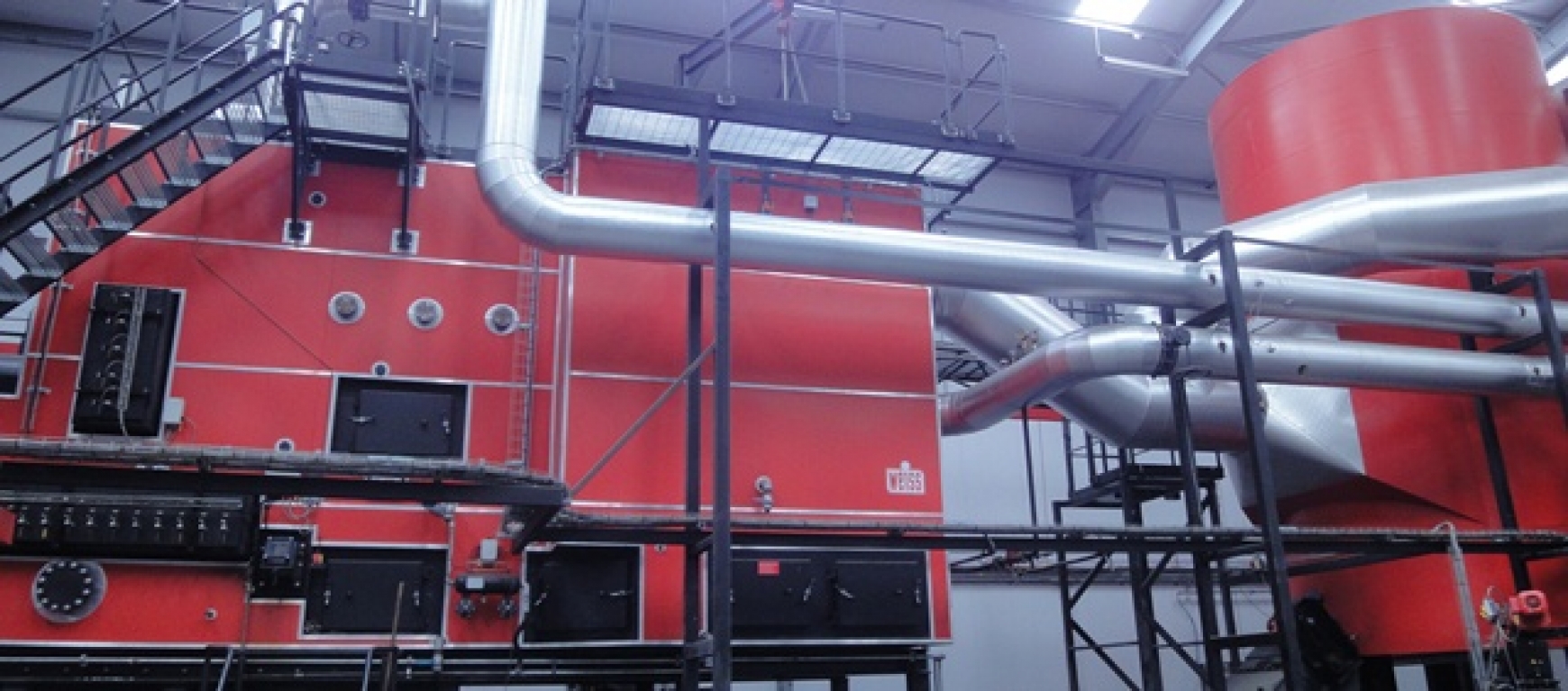 Large red biomass boiler